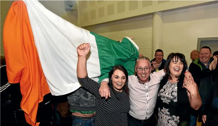  ??  ?? Sinn Fein candidates, from left, Jemma Dolan, Sean Lynch and Michelle Gildernew celebrate winning their seats in Fermanagh South Tyrone, after Northern Ireland’s voters went to the polls for a second time in 10 months following the collapse of the...