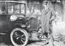  ?? Associated Press file ?? Henry Ford is shown with a Model T in 1921. By doubling his workers’ wages early in the 20th century, Ford contribute­d to the creation of a middle-class America.