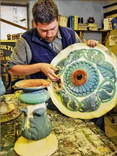  ?? Times Union archive ?? In 2008, Saratoga Springs city artist Phil Steffen worked to restore one of the basins from the 1870’s Morrissey Fountain in a workshop at the city’s DPW garage. The Congress Park landmark has been vandalized multiple times.