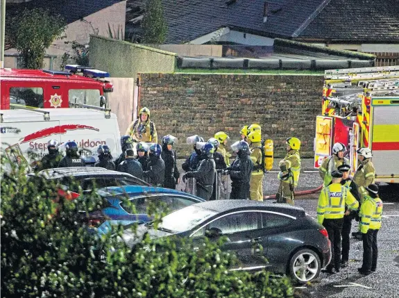  ?? Picture: Paul Reid. ?? Police and emergency services at the scene of the incident in Marketgate, Arbroath, last November.