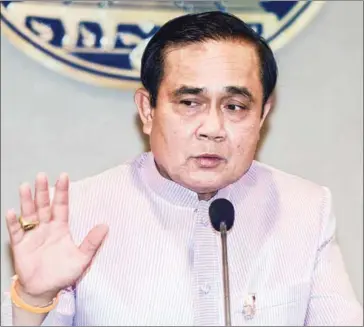  ?? AFP ?? Thai Prime Minister Prayut Chan-o-cha has been accused of aiding in the cover-up of Malaysia’s 1Malaysia Developmen­t Berhad (1MDB) graft scandal by harbouring a fugitive financier.