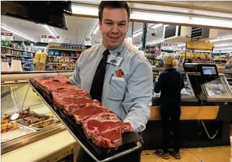  ?? HOLLY SHIVELY / STAFF ?? Dot’s Market at 2274 Patterson Road in Kettering was recently sold to 27-year-old Nick Moshos. He started at Dot’s as a bag boy when he was 16.