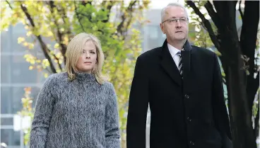  ?? COLIN PERKEL / THE CANADIAN PRESS ?? Laura Miller, former deputy chief of staff to ex- Ontario premier Dalton McGuinty, arrives at court in Toronto with her lawyer Scott Hutchison on Tuesday.