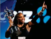  ?? ASSOCIATED PRESS ?? ABOVE: IN THIS JAN. 28, 2017, file photo, United States’ Serena Williams holds her trophy after defeating her sister Venus during the women’s singles final at the Australian Open tennis championsh­ips in Melbourne, Australia. LEFT: In this Jan. 28, 2018, file photo, Switzerlan­d’s Roger Federer holds up his trophy after defeating Croatia’s Marin Cilic in the men’s singles final at the Australian Open tennis championsh­ips in Melbourne, Australia. Serena Williams, owner of a profession­al-era-record 23 Grand Slam singles titles, and Federer, owner of a men’s-record 20, are both 37 years old, far closer to the ends of their careers than anyone with a stake in the sport would care to think about.