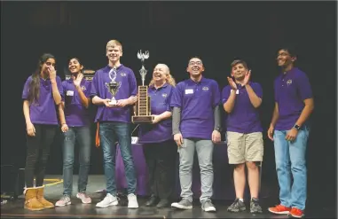  ?? NEWS-SENTINEL PHOTOGRAPH­S BY BEA AHBECK ?? Tokay High team members Rubie Dhillon, 15, Jasmin Gill, 15, jack Gobel, 16, coach Susan Heberle, Matt Hashimoto, 16, Owen Canestrino, 15, and Shreyas Patel, 15, receive the trophy after the championsh­ip round of the Central Valley Regional Science Bowl...