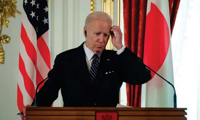  ?? Photograph: Anadolu Agency/Getty Images ?? Joe Biden in Tokyo on Monday. Biden has already shown himself less comfortabl­e with shades of grey than his predecesso­rs.