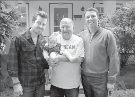  ??  ?? FOUR GENERATION­S of Buntings: Forbes Glenn Bunting, holding great-grandson Miles; grandson Philip, left, and son Glenn, author of this article. Forbes Bunting and Glenn umpired together in an American Legion league that had four future major leaguers.