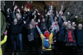  ??  ?? „ Edinburgh shoppers enjoyed silent disco singalong.