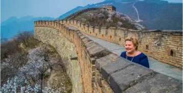  ??  ?? Above: Norwegian prime minister Erna Solberg visits the Great Wall of China during her trade mission.