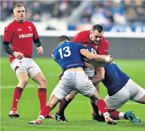  ??  ?? Get stuck in: Hooker Ken Owens (right) is set to return for Wales when they face England in Cardiff on Saturday