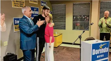  ?? Brian Zahn/Hearst Connecticu­t Media file photo ?? Rick Fontana applauds for West Haven Mayor Dorinda Borer, embracing her son Drew after claiming victory in the 2023 mayoral election on Nov. 7.