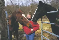  ?? BRIAN KAISER/THE NEW YORK TIMES ?? Pam Mibuck of Enon Valley, Pa., is thinking about leaving her property after the derailment of a train carrying toxic chemicals in nearby East Palestine, Ohio, earlier this month.