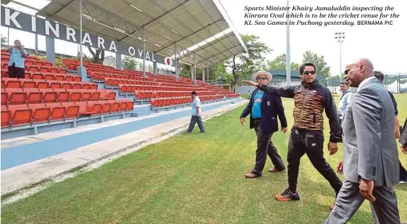  ?? BERNAMA PIC ?? Sports Minister Khairy Jamaluddin inspecting the Kinrara Oval which is to be the cricket venue for the KL Sea Games in Puchong yesterday.