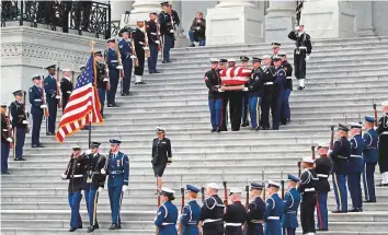  ?? AFP ?? George H.W. Bush’s casket departs the Capitol in Washington yesterday. The former president was remembered as a patrician figure who represente­d an earlier era of civility in US politics.