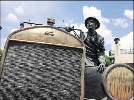  ?? ANDREA SACHS/WASHINGTON POST ?? A sculpture at the Cyrus Avery Plaza depicts the Father of Route 66 in his Model T in Tulsa, Oklahoma.