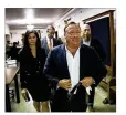  ?? TAMIR KALIFA/ AMERICANST­ATESMAN ?? InfoWars leader Alex Jones, an Austin resident, arrives at the Travis County Courthouse in April.