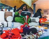  ??  ?? Emirati women making craft at the UAE stall at ATM 2019.