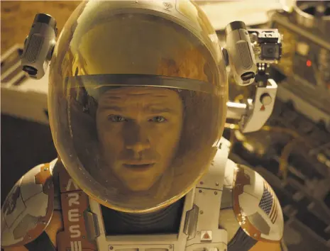  ?? 20th Century Fox ?? Astronaut Mark Watney (Matt Damon) is left behind on Mars by his NASA crew in “The Martian.”