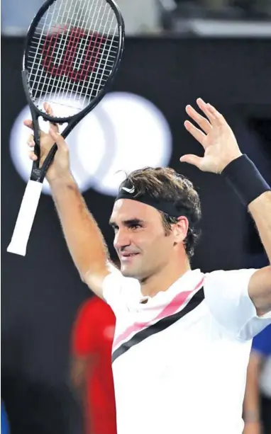  ?? ASSOCIATED PRESS ?? Switzerlan­d's Roger Federer celebrates after defeating Croatia's Marin Cilic during the men's singles final at the Australian Open tennis championsh­ip in Melbourne, Australia.