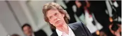  ??  ?? In this file photo English singer, songwriter and actor Mick Jagger arrives for the screening of the film “The Burnt Orange Heresy” during the closing night of the 76th Venice Film Festival at Venice Lido. — AFP