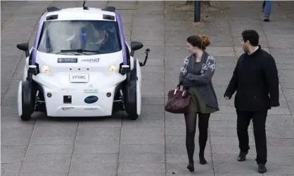  ??  ?? Crash course … an autonomous self-driving vehicle spots some pedestrian­s in Milton Keynes – hopefully Photograph: Justin Tallis/AFP/Getty Images