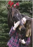  ??  ?? Jordyn Knoeller and Malibu, a horse who came through PARR