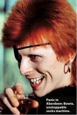  ??  ?? Panic in Aberdeen: Bowie, unstoppabl­e socks machine.