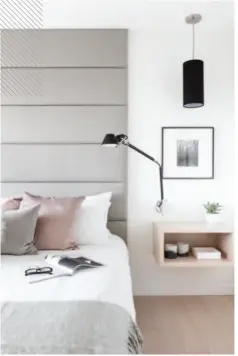  ??  ?? Sweet Retreat In the master bedroom (right), Rodman brought in soft fabrics and cozy throws to warm up the space. Charcoal- coloured grasscloth lines the wall at the foot of the bed (far right), which has the effect of minimizing the appearance of the...