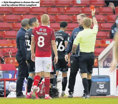  ??  ?? > Kyle Naughton is shown the red card by referee Oliver Langford