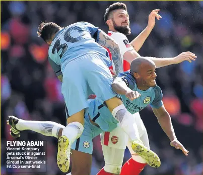  ??  ?? FLYING AGAIN Vincent Kompany gets stuck in against Arsenal’s Olivier Giroud in last week’s FA Cup semi-final