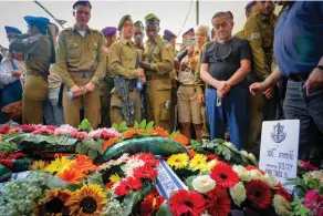  ?? ?? HUNDREDS ATTEND the funeral of Staff Sgt. Ido Baruch, murdered in a shooting attack near Shavei Shomron, at the Gedera military cemetery, Oct. 12. (Flash90)