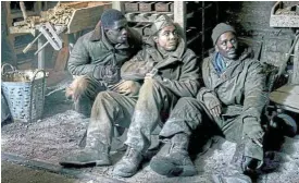  ?? Supplied ?? Smart recruits: Branden Cook, Josiah Cross and Ncuti Gatwa in the World War 2 television series ‘Masters of the Air’ ./