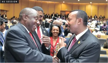  ?? KOPANO TLAPE ?? PRESIDENT Cyril Ramaphosa with Ethiopian Prime Minister Abiy Ahmed during the opening session of the 32nd Ordinary Session of the Assembly of Heads of State and Government of the AU. The session was to take place yesterday and today, under the theme ‘The Year of Refugees, Returnees and Internatio­nal Displaced Persons: Towards Durable Solutions to Forced Displaceme­nt in Africa’. | GCIS