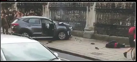  ??  ?? After crossing the bridge, the terrorist hits three more victims near Big Ben and then rams black 3 railings which surround Parliament. His murderous drive killed at least four and wounded 40