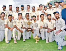  ??  ?? Players of the Hyderabad Cricket Associatio­n XI are all smiles after winning the Moin-udDowlah Gold Cup cricket tournament at the Rajiv Gandhi Internatio­nal Cricket Stadium in Hyderabad on Thursday. — DECCAN CHRONICLE