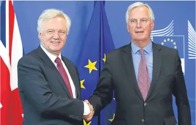  ?? Picture: Getty. ?? Brexit secretary David Davis and EU negotiator Michel Barnier.