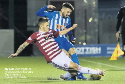  ??  ?? My ball Scott Martin of Accies tackles Killie’s Greg Taylor during a Premiershi­p match