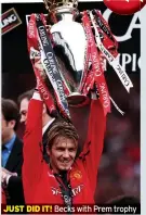  ?? ?? JUST DID IT! Becks with Prem trophy