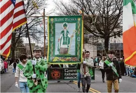  ?? Hearst Connecticu­t Media file photo ?? Members of the Greenwich Hibernian Associatio­n march in Greenwich's annual St. Patrick's Day Parade in 2022.