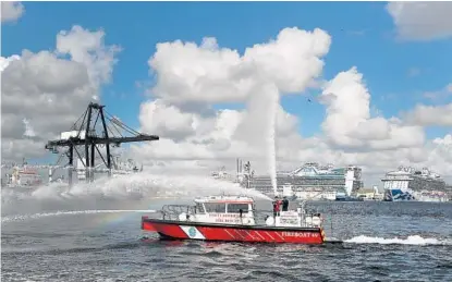  ?? MIKE STOCKER/STAFF PHOTOGRAPH­ER ?? The 43-foot jet-powered Fireboat 49 will allow the Fort Lauderdale Fire Department to answer calls in any weather short of a hurricane.