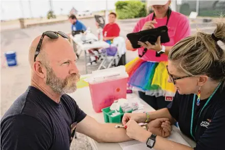  ?? Marie D. De Jesús/Staff photograph­er ?? A man gets a free Jynneos vaccine to prevent monkeypox Saturday at a Galveston County Health District mobile clinic.