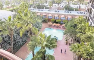  ??  ?? THE RECENTLY RENOVATED Hotel Lucerna features a courtyard with swimming pool.