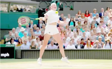  ??  ?? Latvia’s Jelena Ostapenko in action during her semi final match against Angelique Kerber of Germany at All England Lawn Tennis and Croquet Club, London. — Reuters photo