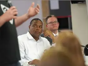  ?? ?? Mr. Gainey listens to speakers during the town hall.