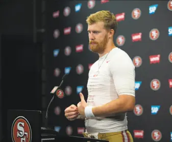  ?? D. Ross Cameron / Special to The Chronicle ?? Quarterbac­k C.J. Beathard speaks to reporters during training camp in Santa Clara in August. The 49ers are set to play five prime-time TV games in the schedule’s next eight weeks.