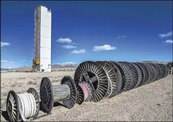  ?? BENJAMIN HAGER/LAS VEGAS REVIEW-JOURNALL ?? The diagnostic­s canister tower with cable reels at Icecap Ground Zero is seen on Jan. 11 at the Nevada National Security Site in Mercury.