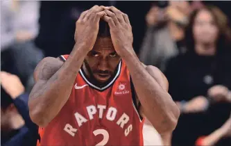  ?? FRANK GUNN THE CANADIAN PRESS ?? Toronto Raptors forward Kawhi Leonard can’t believe he knocked the ball out of bounds with two seconds left in a tie game against the Detroit Pistons on Wednesday. The Raptors lost 106-104, their second in a row.