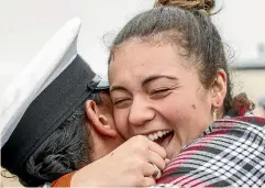  ?? GETTY IMAGES ?? Takimoana Hawea has two reasons to celebrate her partner Jacob Biddle returning from deployment, after he got down on one knee and asked her to marry him.