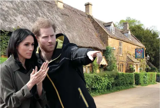  ??  ?? The Sussexes in Oxfordshir­e: the Great Tew Estate, home to royalty and the Beckhams