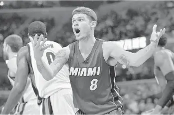  ?? AP FILE PHOTO ?? Heat guard Tyler Johnson, seen arguing a call in November, scored 37 points in the Heat’s losses Thursday and Friday.
